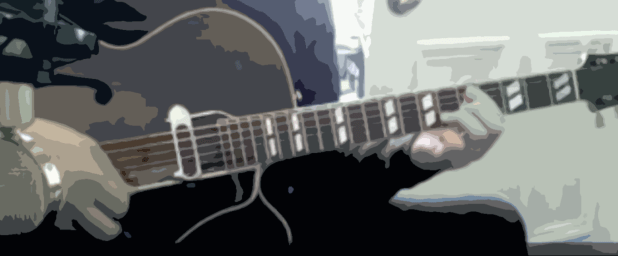 Image of Grahm Tichy playing an electric guitar