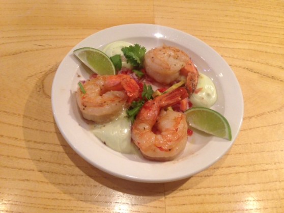 Gambas al Ajillo  Grilled Jumbo Shrimp in a garlic and wine sauce over cous cous